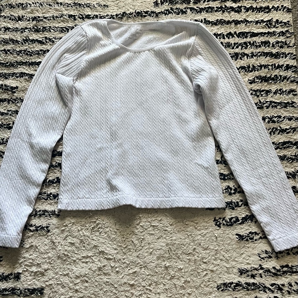 white cable-knit long sleeve tee